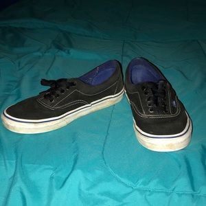 Black and blue Era Vans